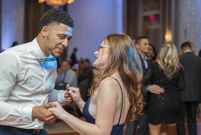 couple dancing on the dance floor at a corporate event